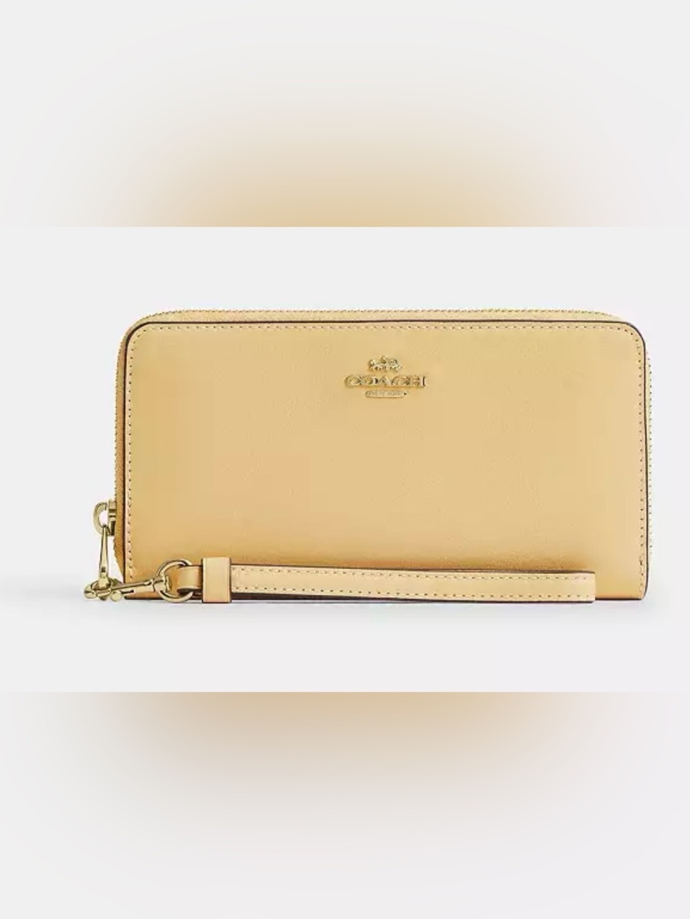 Coach Leather Wristlet in Pale Yellow with Gold Logo